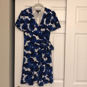Blue, black and white wrap dress. Never worn